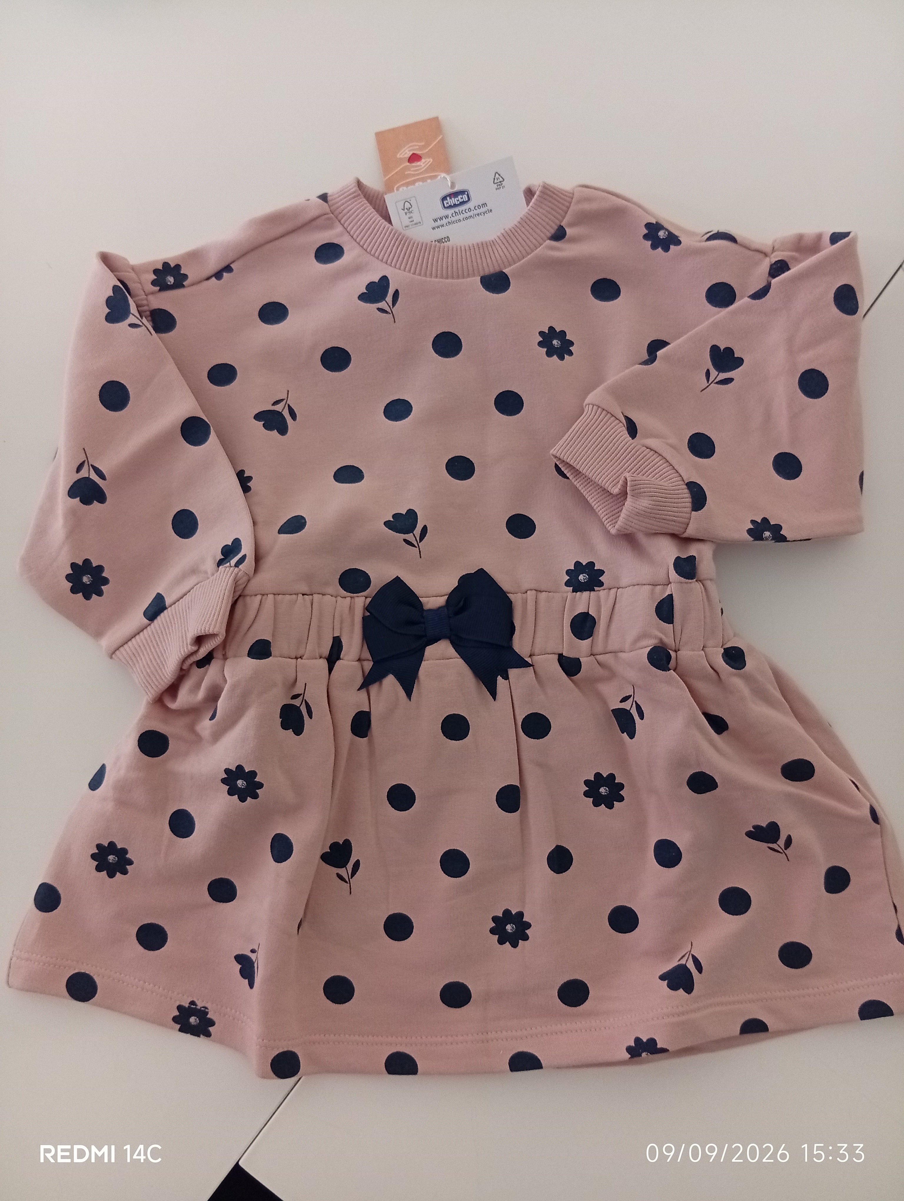 Vestitino in felpa Chicco rosa a pois e fiori con fiocco blu